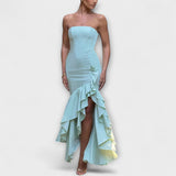 Zuri — maksikleita ar atkailinātiem pleciem un asimetrisku apakšmalu