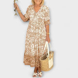 Caitlin - Elegancka sukienka w kwiaty o zwiewnym designie