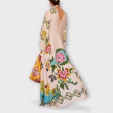 Lisa - Elegancka maxi sukienka w kwiatowy wzór i luźnym fasonie